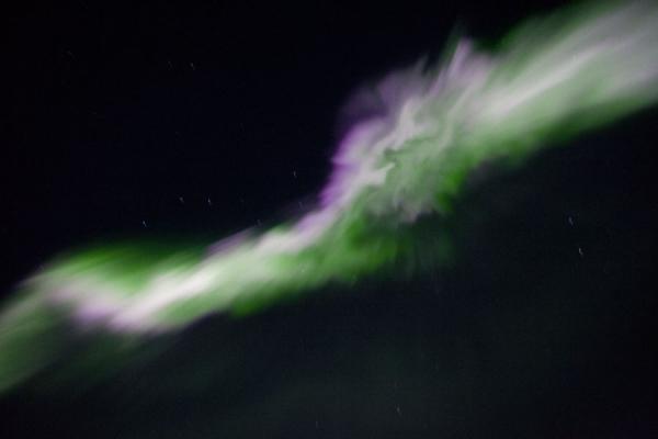 Bright colours right overhead making for a corona | Abisko aurore polaire | la Suède