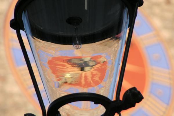Picture of Clock of Town Hall seen through a lantern