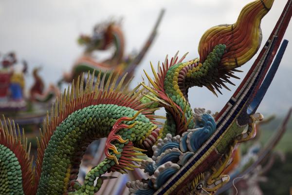 Detail of colourful animals decorating the roof of Guandu temple | Guandu temple | Taiwan