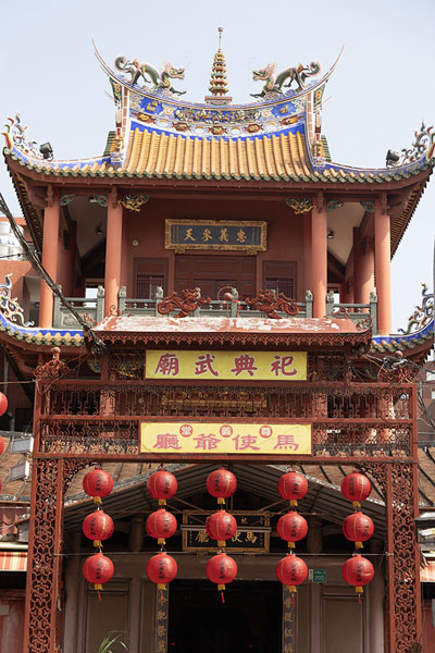 Picture of Tainan (Taiwan): Richly decorated building with red lanterns next to the God of War temple