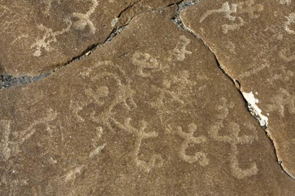 Picture of Langar petroglyphs (Tajikistan): Petroglyphs in a brown rocky surface