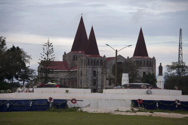 Picture of Nuku'alofa (Tonga): The Basilica of St. Anthony of Padua towering above the Royal Tombs