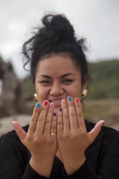 Picture of Showing off her colourful nailsTonga - Tonga