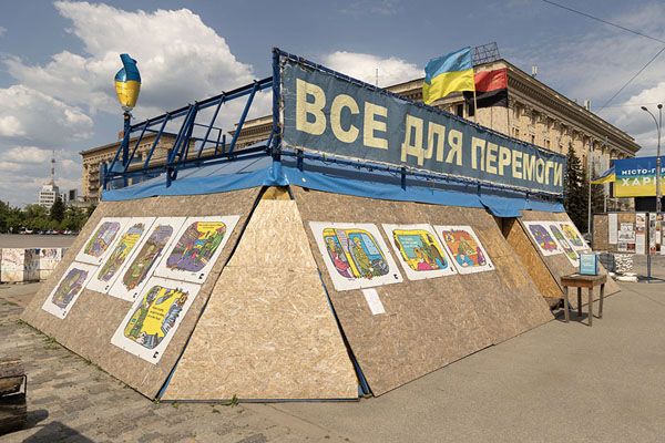 Stand on Freedom Square with slogans and artwork, the slogan reads Everything for the Win | Kharkiv Freedom Square | Ukraine