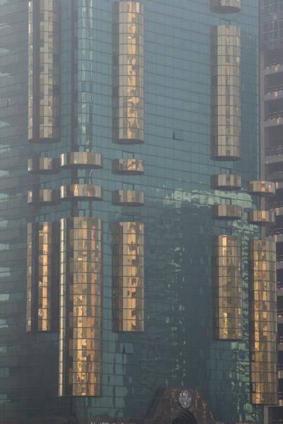 Close-up of modern glass building on Sheikh Zayed Road | Dubai modern architecture | United Arab Emirates