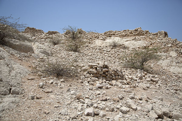 Picture of Walls can easily be spotted amongst the stones on the hill where Qasr al-Zabba can be foundShimal - United Arab Emirates