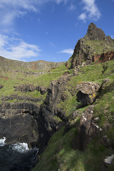 Picture of Giant's Causeway (United Kingdom): Volcanic rocks rising steeply out of the waves of the Atlantic