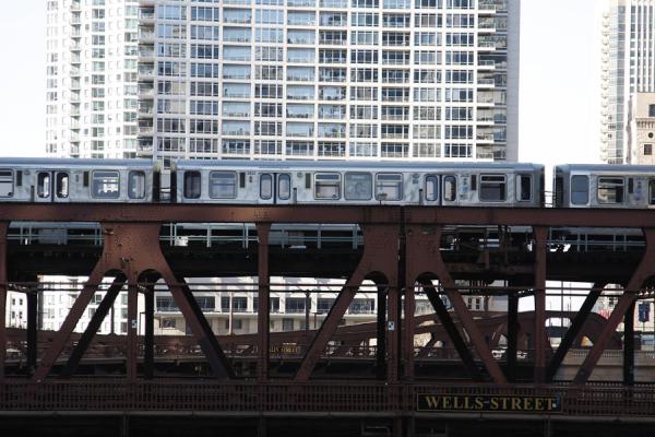 Train crossing a bridge over Chicago River | Chicago Riverwalk | United States