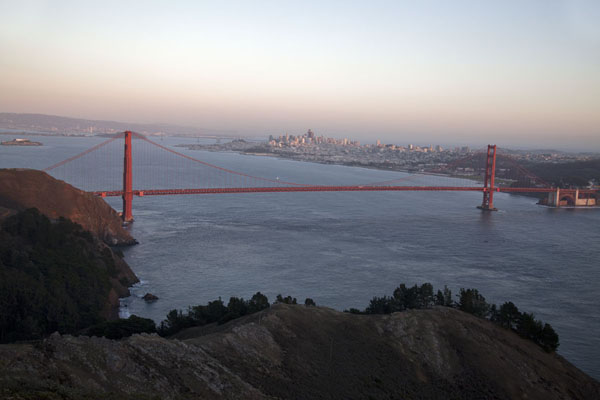 Picture of Golden Gate Bridge (United States): Sunset over Golden Gate Bridge with San Francisco in the background