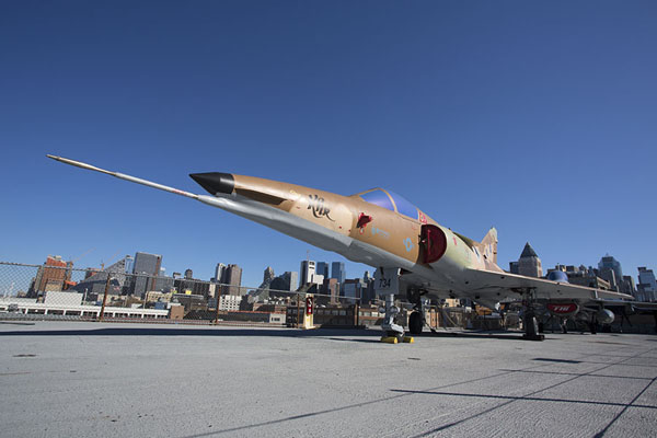Picture of Looking up the Kfir C-2 fighter plane on the flight deck of the Intrepid - United States - Americas