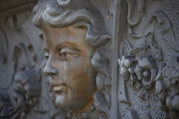 Picture of Saint Marks Place (United States): Sculpted head on the frontside of the Physical Graffiti building on St Marks Place