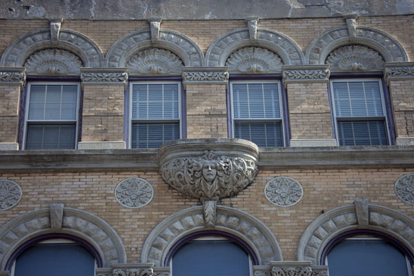 Picture of Close-up of the upper part of a building at St Marks Place with decorated windows