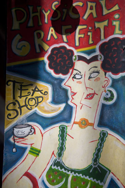 Picture of Colourful and artsy sign for a tea shop at Physical Graffiti on St Marks Place