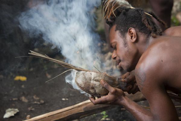 Picture of Nemalits Small Namba's (Vanuatu): Making fire without matches: Small Namba guy in action