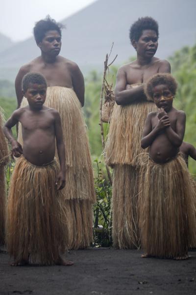Picture of Tanna traditional village (Vanuatu): Villagers dressed up in grass skirts