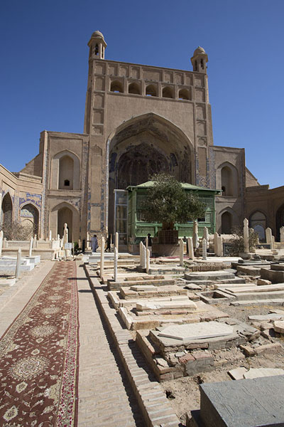 Carpet on the floor, tombs in the courtyard of the shrine of Ansari, Afghanistan
