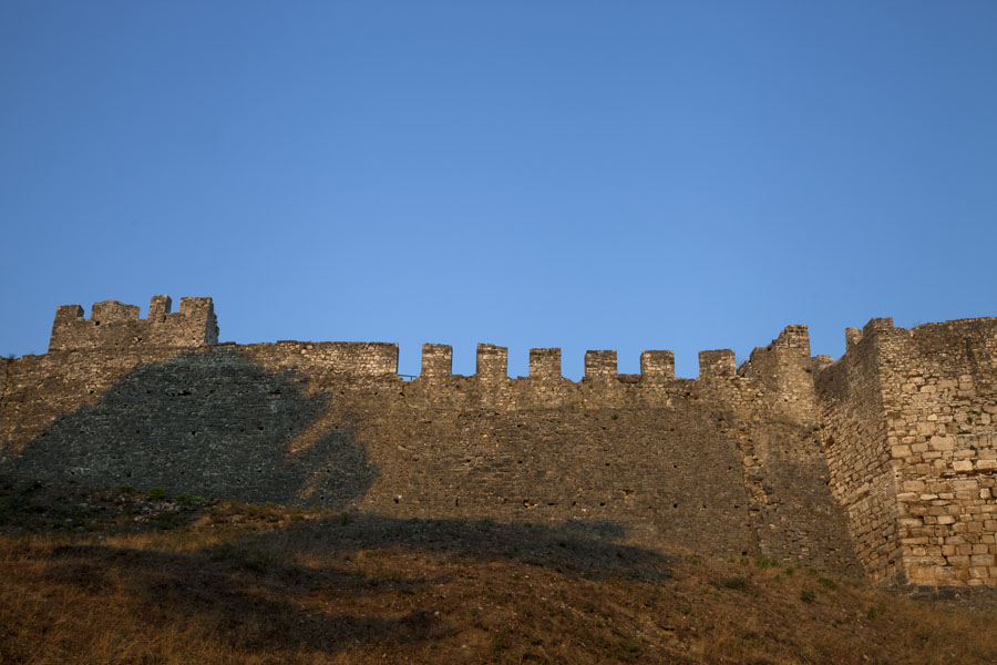 The crenellated wall of the citadel of Berat in the early morning, Albania
