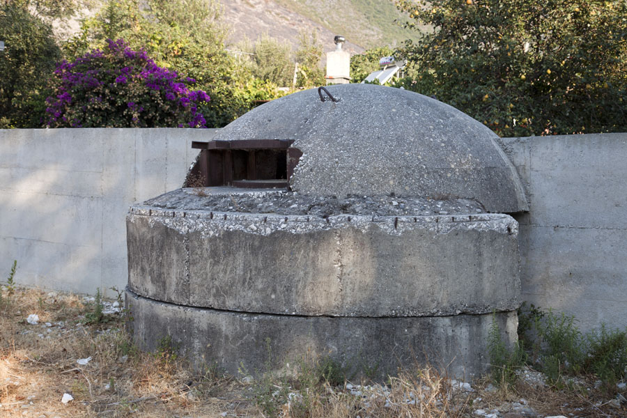 Bunker integrated into the wall around a house, Albania