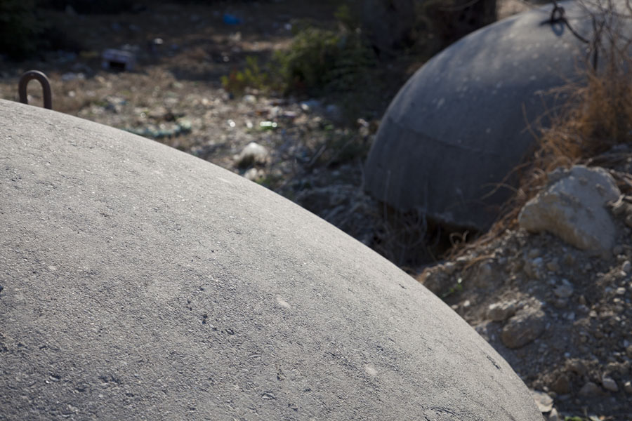 Round curves of two bunkers close to the Borsh beach, Albania
