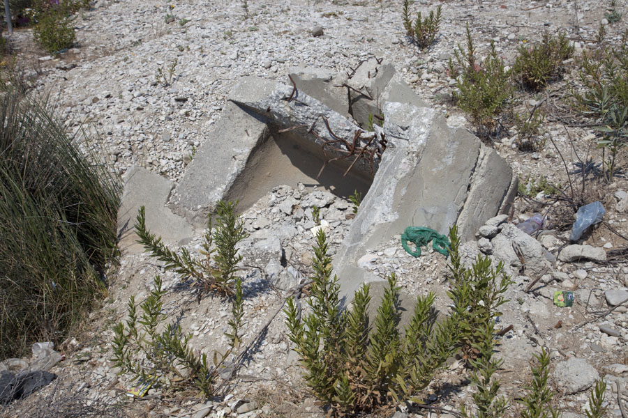 Remains of a dismantled bunker at Borsh beach, Albania
