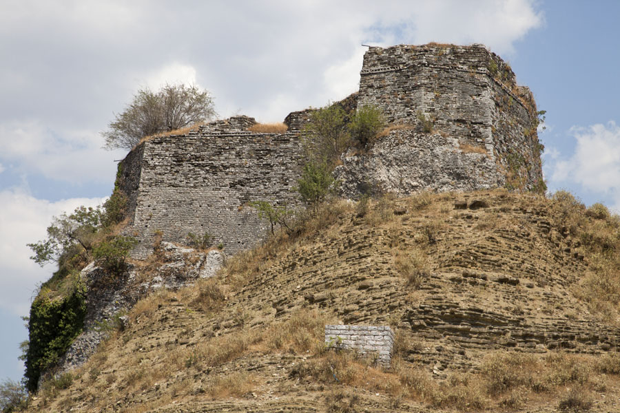 Ruins on top of the hill where the castle was built, Albania Part of the ruins of the castle of Gjirokastër, Albania