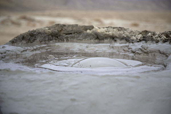 Foto di Bubble forming in a mud volcano at GobustanGobustan - Azerbaigian