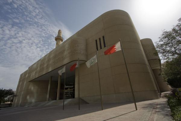 Flags and the Beit al Quran seen from a corner | Beit al Quran | Bahrain