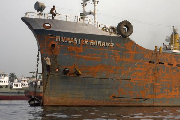 Working on a ship in the river, Bangladesh