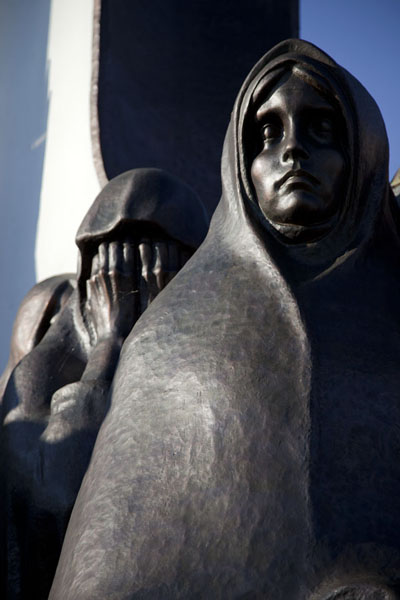 Row of weeping women surrounding the chapel, Belarus