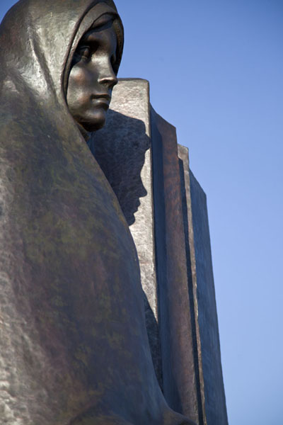 Close-up of one of the weeping ladies surrounding the monument on the Island of Tears, Belarus