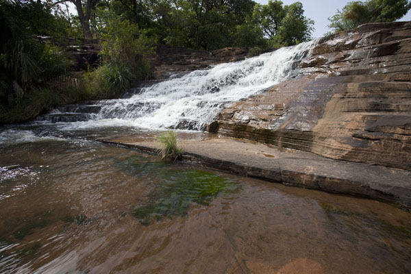 Waterfall rushing down the rocks at Karfiguela | Cascadas de Karfiguela | Burkina Faso