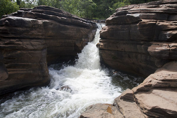 Water rushing down the rocks at Karfiguela | Cascadas de Karfiguela | Burkina Faso