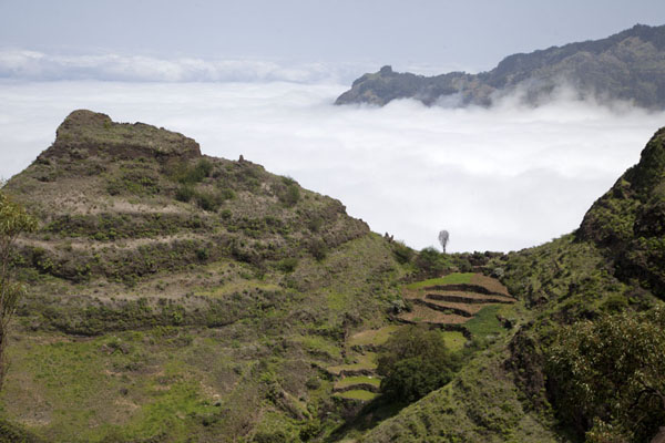 Ridge of the mountains east of Cova with terrace and clouds, Cabo Verde