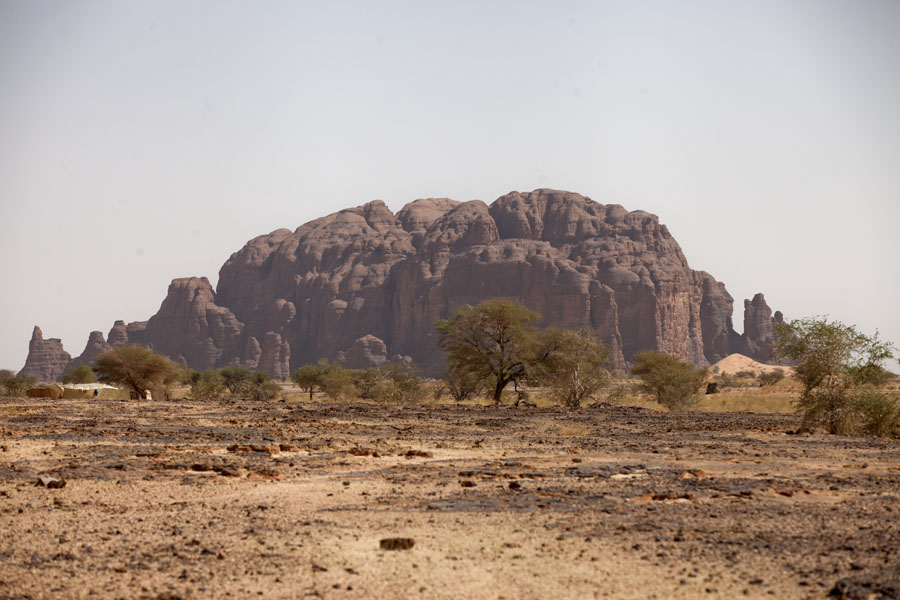 Picture of Big rock formation with trees at the west side of the Terkei massifTerkei - Chad