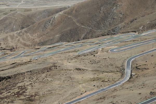 Switchbacks on the road to Ganden monastery | Ganden Monastery | China