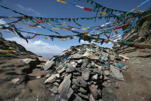 Prayer flags on the highest point of the high kora of Ganden | Ganden Monastery | China