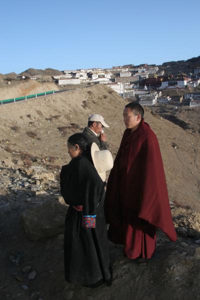 People getting off the bus just before reaching Ganden monastery | Ganden Monastery | China