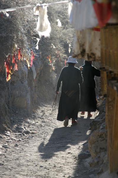 Pilgrims and prayer wheels on Tashilhunpo kora, China
