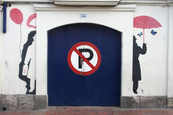 Door with art on the wall in La Candelaria, Colombia