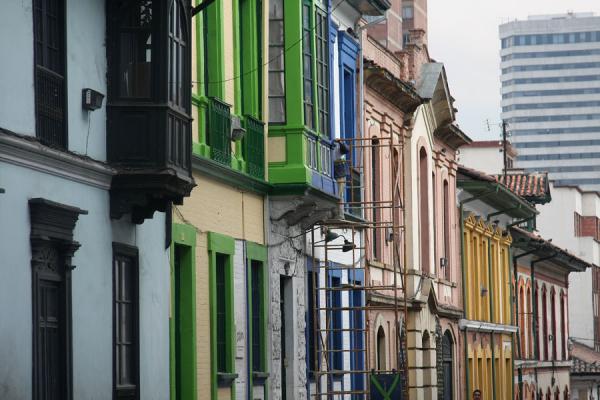 Typical houses of La Candelaria with modern building in the background, Colombia
