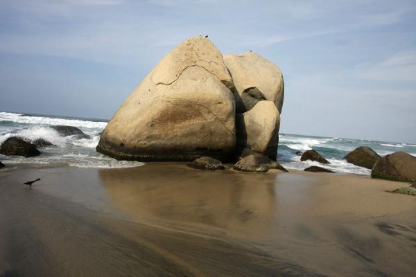 Huge boulder on the beach of Arrecifes, Colombia