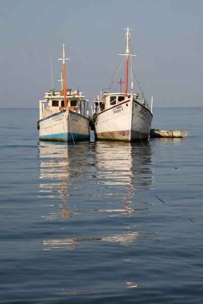 Fishing boats floating idly in the bay of Taganga, Colombia