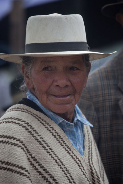 Woman with hat at the market of Villa de Leyva, Colombia