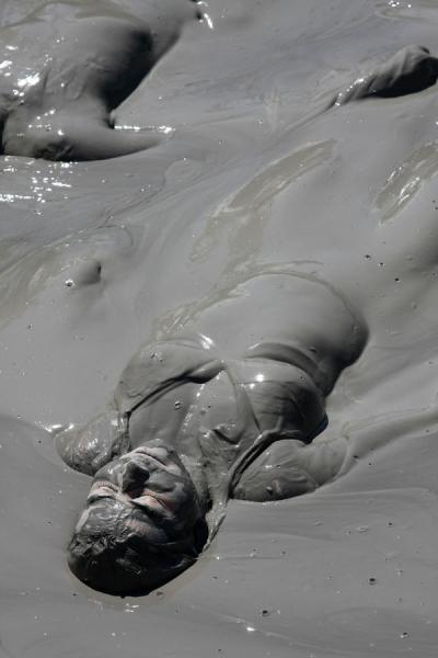 Close-up of woman inside the crater of Volcano Totumo, Colombia