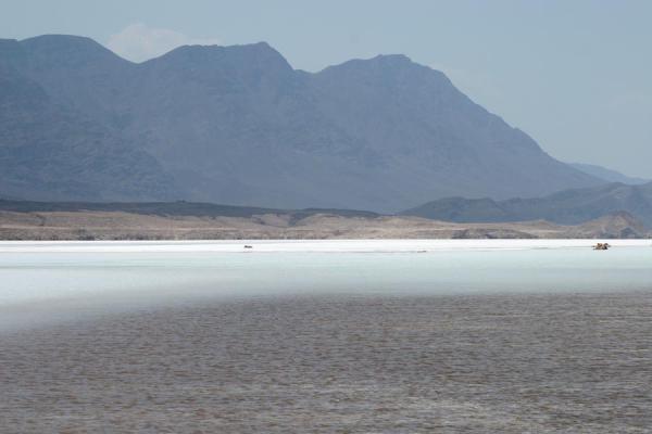 Salty water and solid salt in the background: landscape of Lac Assal, Lac Assal, Djibouti