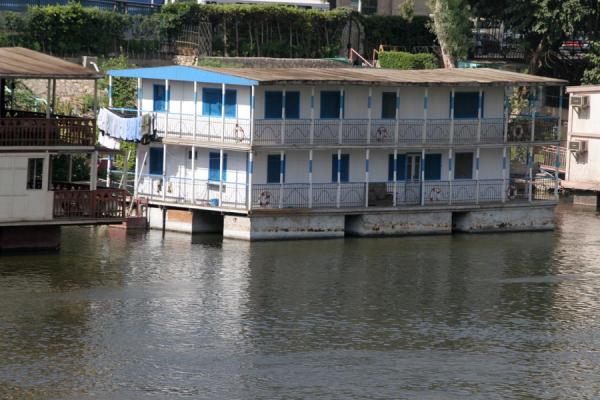 One of the houseboats seen from the other side of the river Nile, Egypt