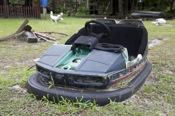 Picture of One of the luna park toys stuck in the ground off Cap EsteriasLibreville - Gabon
