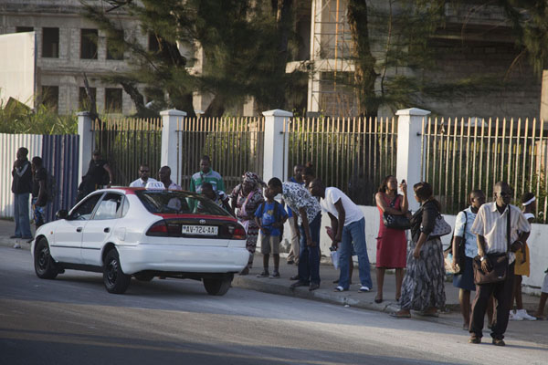 People trying to get a ride on a taxi in Libreville | Libreville taxi drivers | Gabon