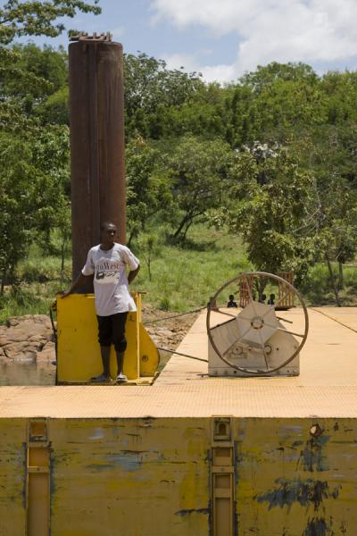 Ghanaian waiting for the boat to dock at Dodi Island | Lake Volta Cruise | Ghana