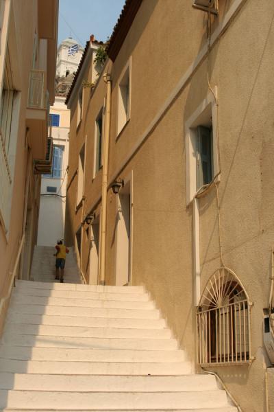 Street with stairs in Poros town, Greece